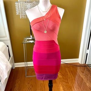 One shoulder Baby Phat bodycon dress.  Sexy body hugging dress.